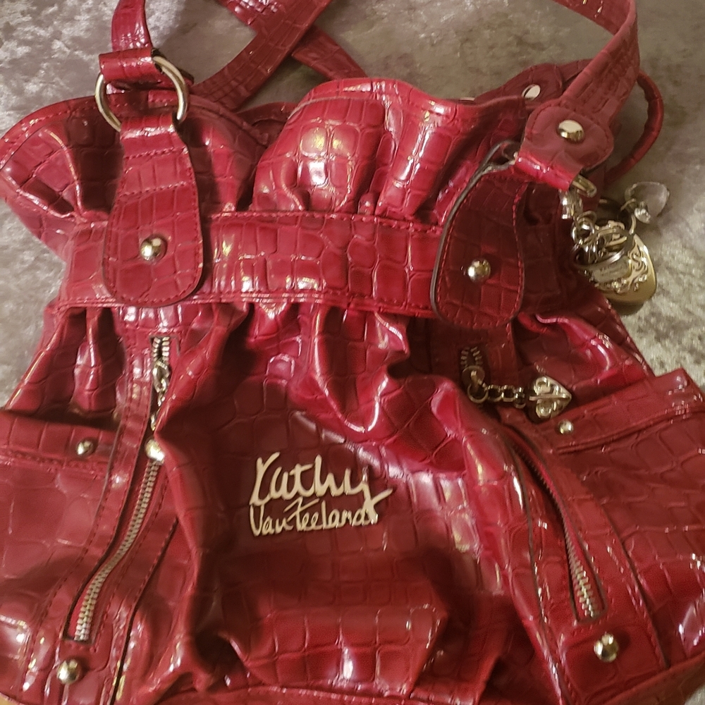 Kathy Van Zeeland red handbag